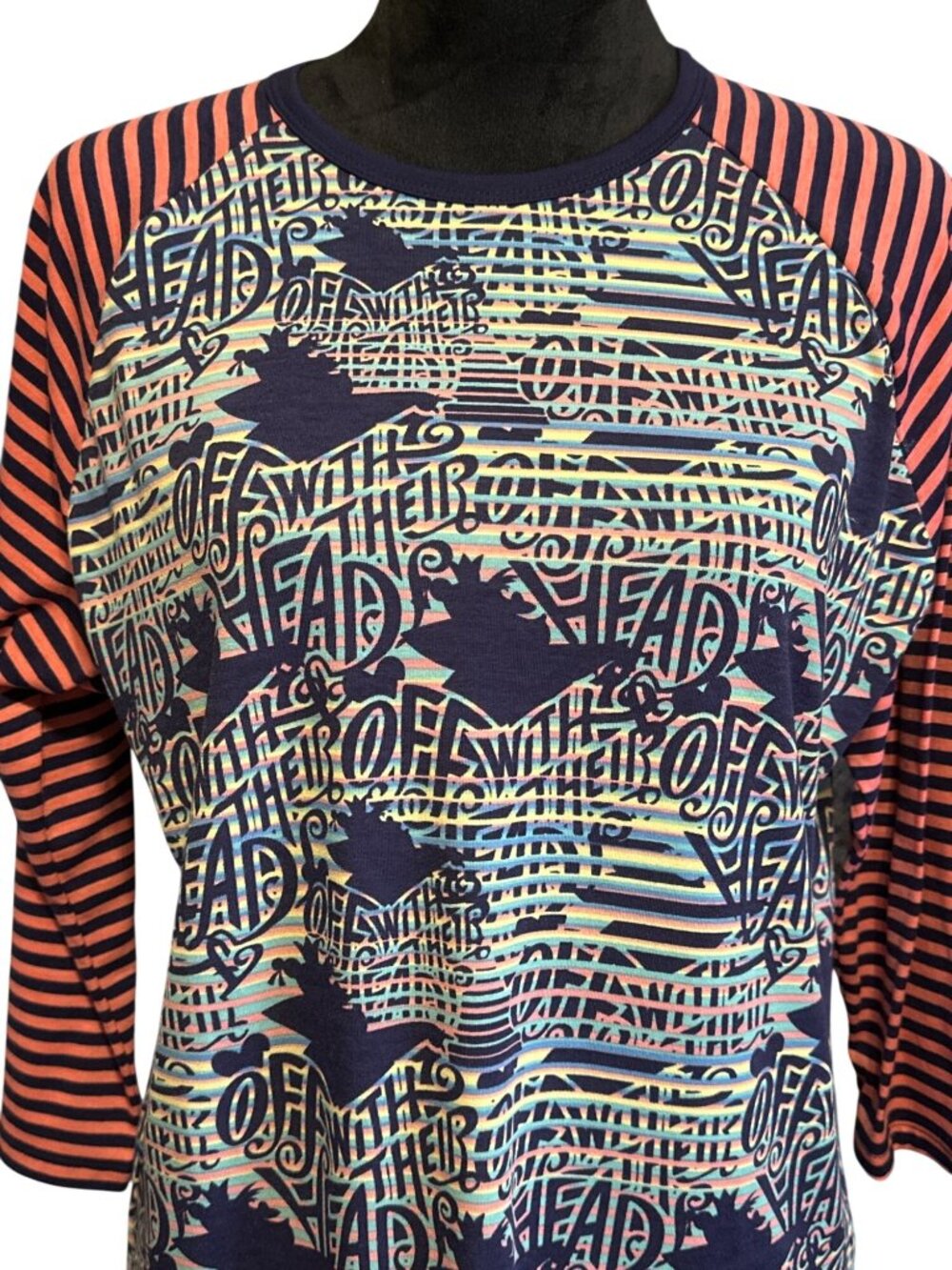 LuLaRoe Womens Raglan Alice In Wonderland Graphic "Off With Their Heads" Top Nav